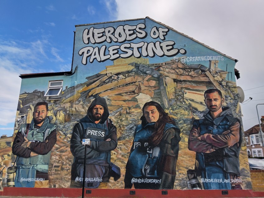 Street art depicting Palestinian journalists