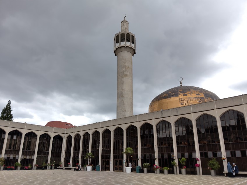 Mosque with pillars and a golden dome