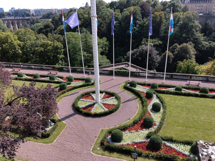 Garden with flowers and flags