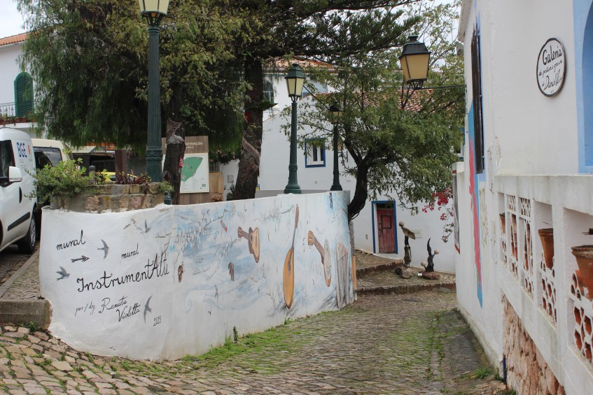 Portuguese village and art on a white wall