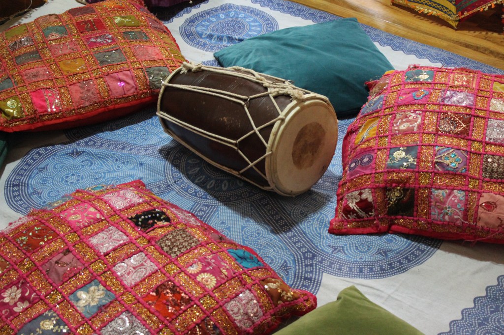 A drum with colourful cushions